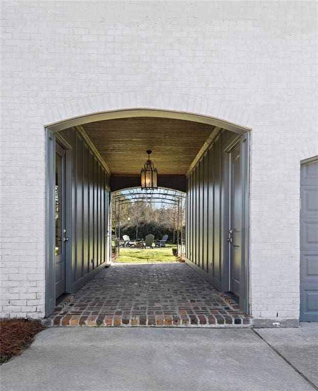 exterior space with decorative driveway