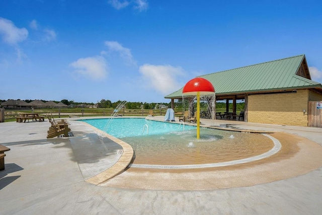 community pool featuring a patio