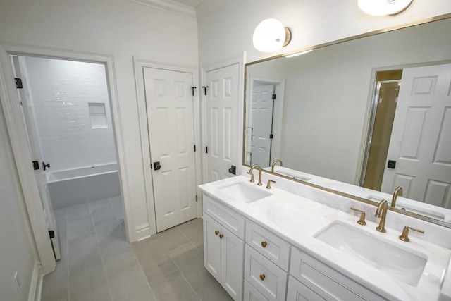 full bath featuring double vanity, a shower with shower door, and a sink