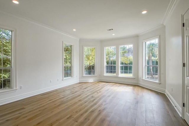 unfurnished sunroom featuring visible vents