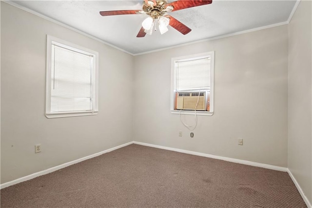 empty room featuring baseboards, cooling unit, carpet flooring, and crown molding