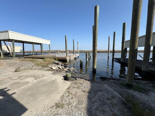 view of dock with a water view