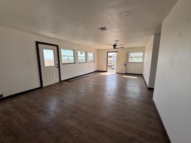 entrance foyer featuring visible vents, baseboards, wood finished floors, and a ceiling fan