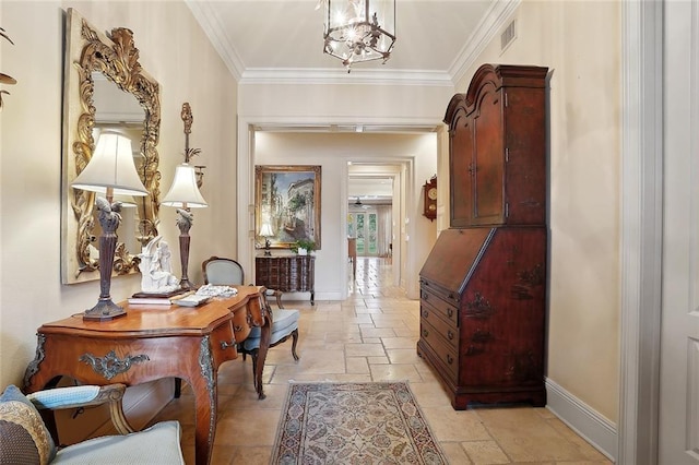 interior space featuring stone tile floors, visible vents, baseboards, ornamental molding, and a notable chandelier