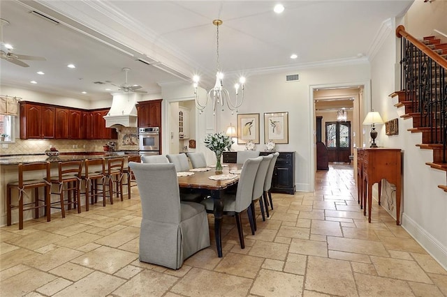 425 Turquoise St, New Orleans, LA 70124 - dining area featuring stairs, baseboards, stone tile flooring, ceiling fan with notable chandelier, and visible vents