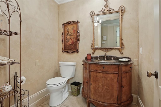 425 Turquoise St, New Orleans, LA 70124 - bathroom with toilet, vanity, and baseboards