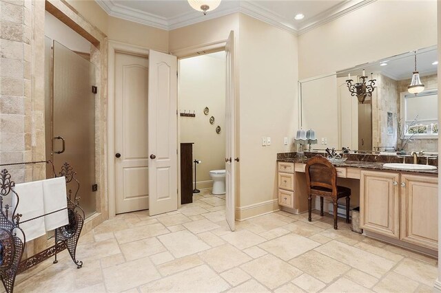 425 Turquoise St, New Orleans, LA 70124 - bathroom featuring a stall shower, crown molding, toilet, vanity, and stone tile flooring