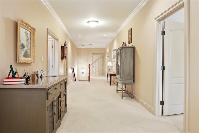 425 Turquoise St, New Orleans, LA 70124 - hallway featuring ornamental molding, light carpet, baseboards, and an upstairs landing