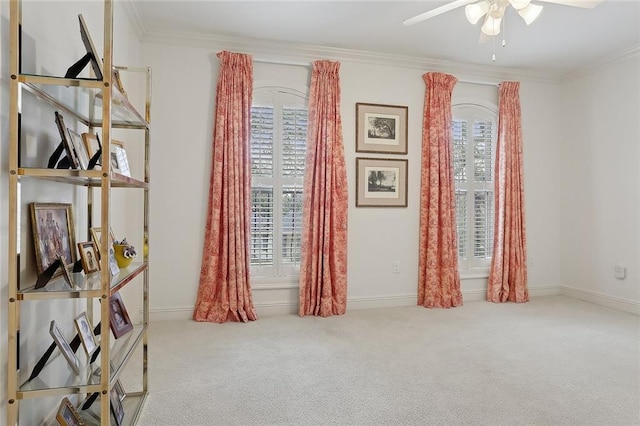 425 Turquoise St, New Orleans, LA 70124 - interior space with baseboards, crown molding, ceiling fan, and carpet