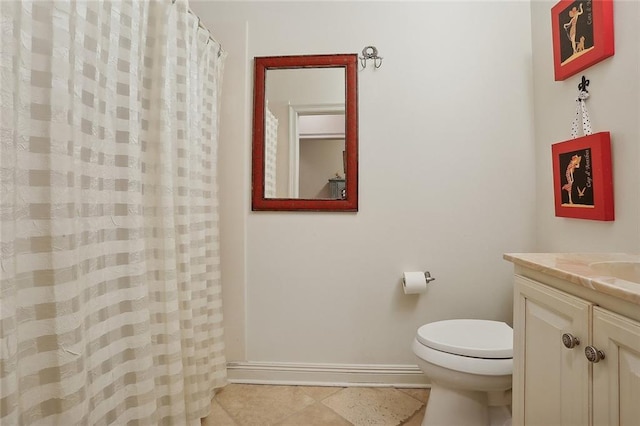 425 Turquoise St, New Orleans, LA 70124 - full bathroom featuring baseboards, toilet, tile patterned floors, and vanity