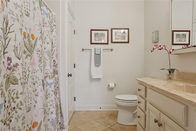 425 Turquoise St, New Orleans, LA 70124 - full bath featuring toilet, curtained shower, vanity, tile patterned flooring, and baseboards