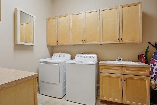 425 Turquoise St, New Orleans, LA 70124 - laundry area featuring washing machine and dryer, cabinet space, and a sink