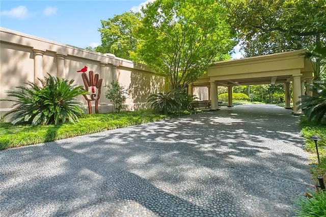 exterior space with decorative driveway