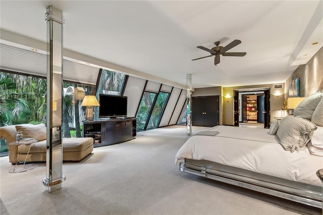 carpeted bedroom featuring visible vents and ceiling fan