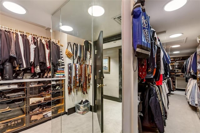 spacious closet featuring visible vents