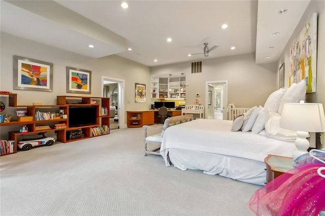 bedroom with light carpet, visible vents, and recessed lighting