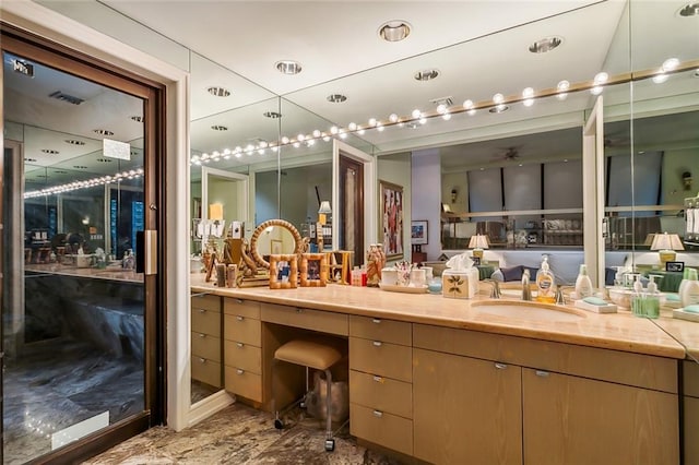 bathroom with visible vents and vanity