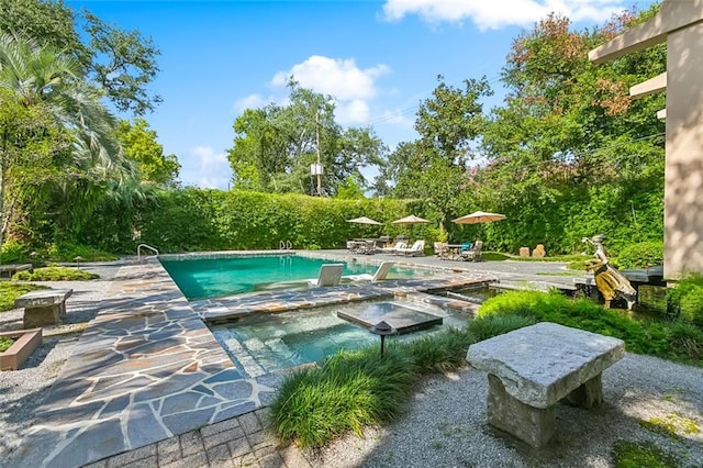 pool featuring a patio area