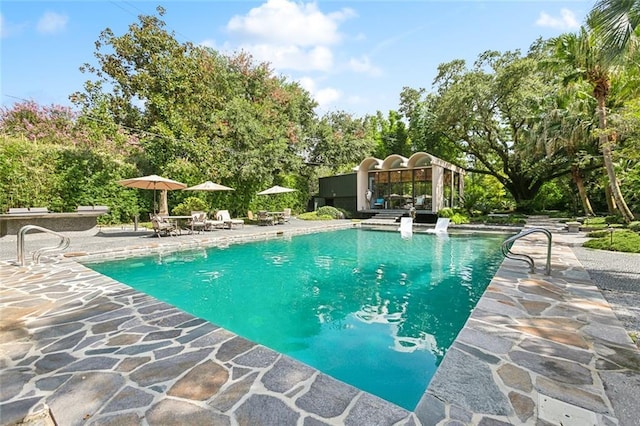 pool with a patio