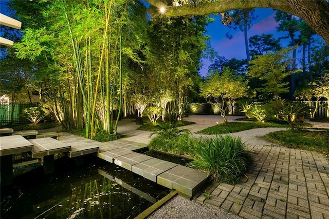 surrounding community featuring a patio area and fence