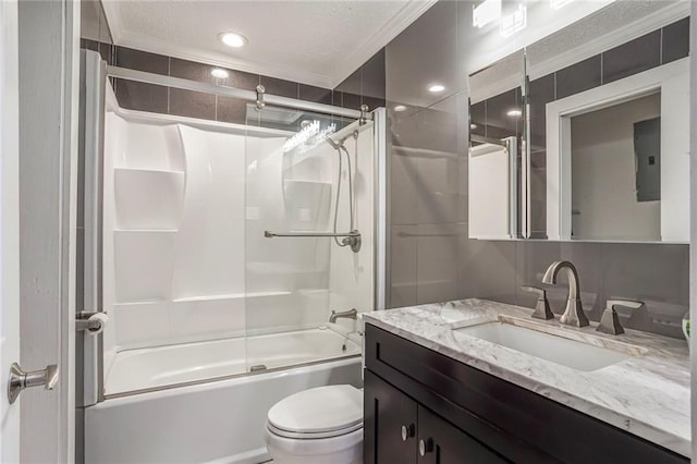 bathroom with recessed lighting, shower / bath combination with glass door, vanity, and toilet