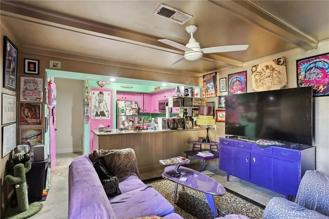 living room featuring beam ceiling, visible vents, and a ceiling fan