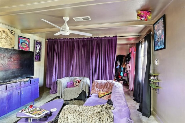 interior space featuring light tile patterned floors, visible vents, beamed ceiling, and ceiling fan