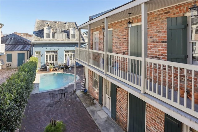 outdoor pool with a patio