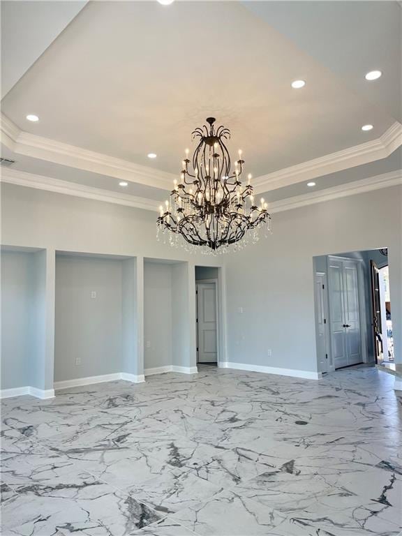 unfurnished room featuring recessed lighting, baseboards, and a raised ceiling