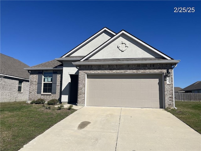 view of front of house featuring a front yard, concrete driveway, brick siding, and an attached garage