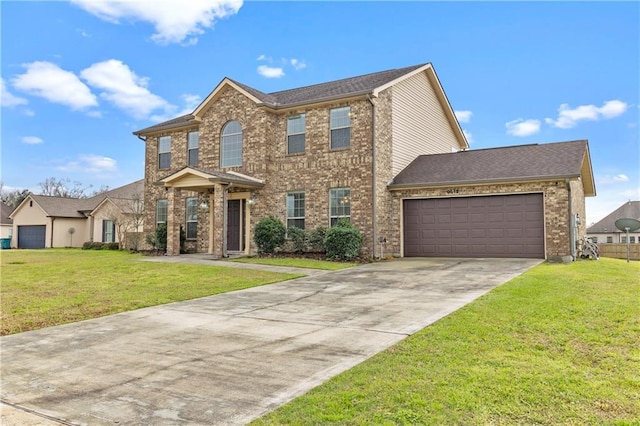 view of front facade featuring a garage, driveway, brick siding, and a front lawn