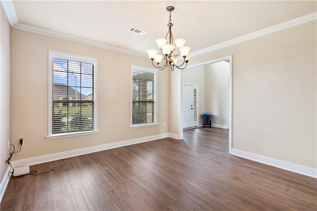 unfurnished dining area featuring baseboards, visible vents, dark wood-type flooring, an inviting chandelier, and crown molding