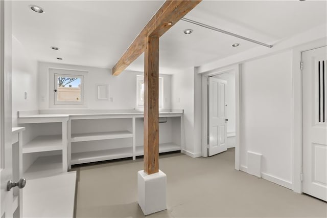 interior space with recessed lighting and baseboards