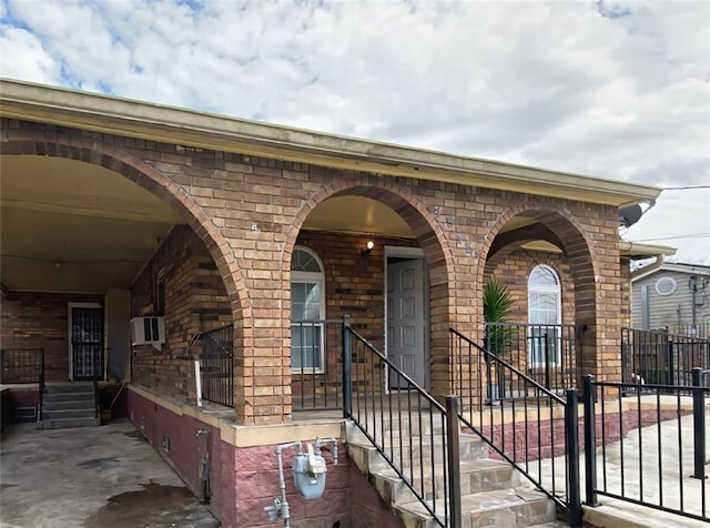 view of front facade featuring brick siding