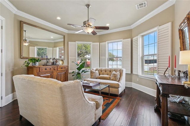 living room featuring dark wood-style floors, visible vents, crown molding, and baseboards