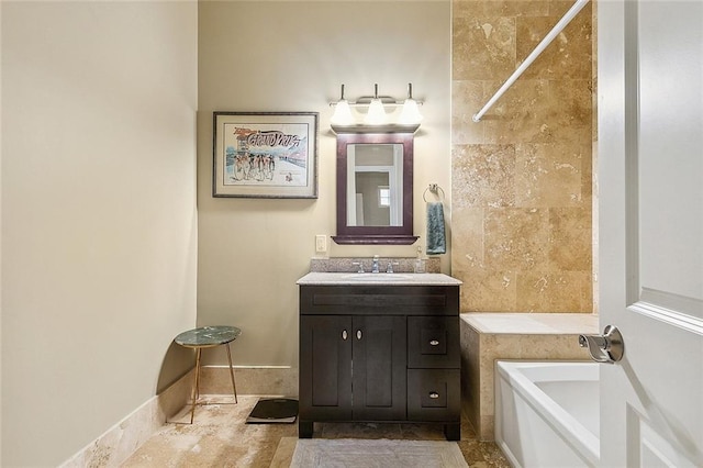 full bath with vanity and a bathing tub