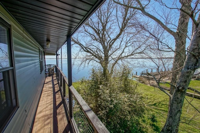 balcony featuring a water view