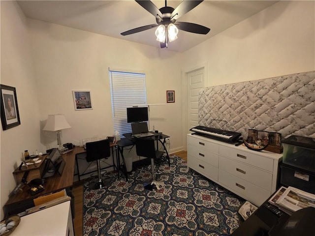 office space featuring wood finished floors and a ceiling fan