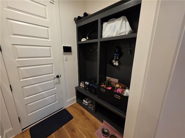 mudroom with wood finished floors