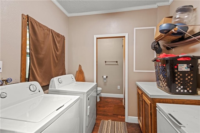 laundry room with laundry area, baseboards, ornamental molding, dark wood-type flooring, and separate washer and dryer