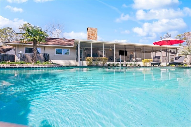 pool featuring a sunroom