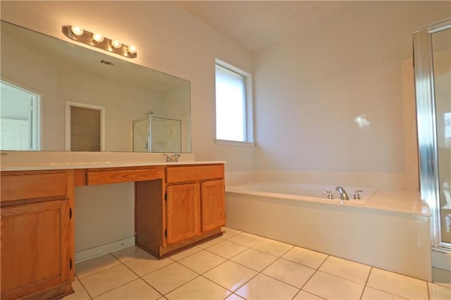 full bathroom with a garden tub, tile patterned flooring, vanity, and a shower stall