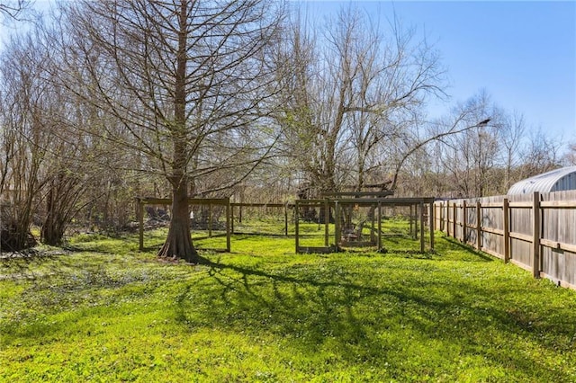 view of yard with fence