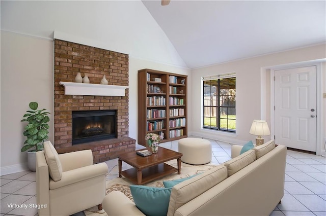 living area featuring light tile patterned floors, baseboards, a brick fireplace, and high vaulted ceiling