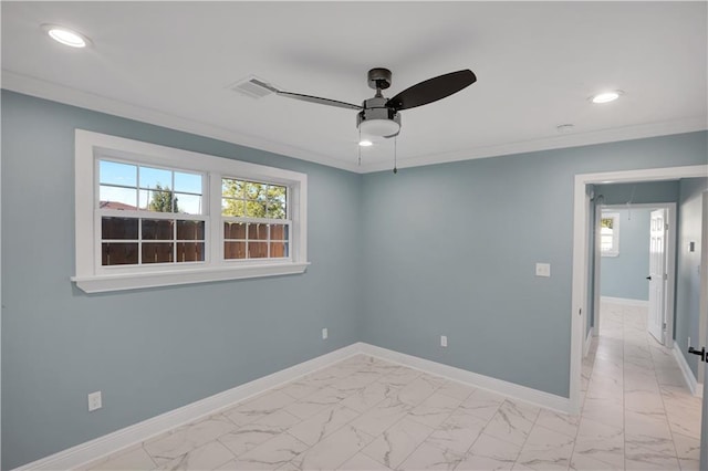 unfurnished room with crown molding, ceiling fan, recessed lighting, marble finish floor, and baseboards