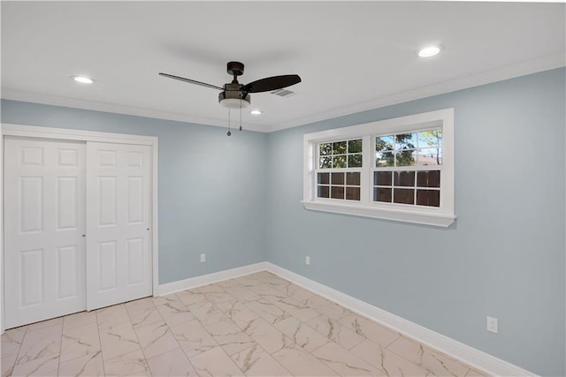 unfurnished bedroom with crown molding, baseboards, recessed lighting, and marble finish floor