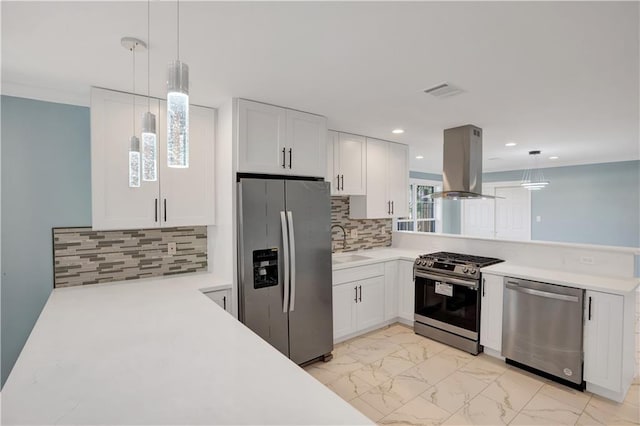 kitchen featuring a peninsula, appliances with stainless steel finishes, marble finish floor, light countertops, and island range hood