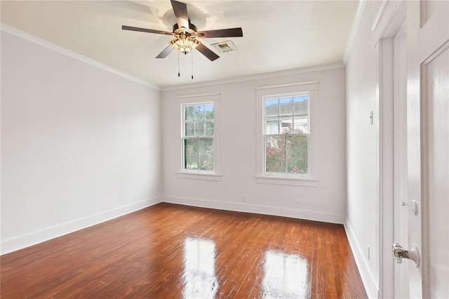 4500 S Rocheblave St, New Orleans, LA 70125 - spare room featuring hardwood / wood-style floors, baseboards, a ceiling fan, and ornamental molding