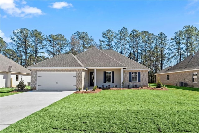 view of front of home featuring concrete driveway, a front lawn, an attached garage, and central air condition unit