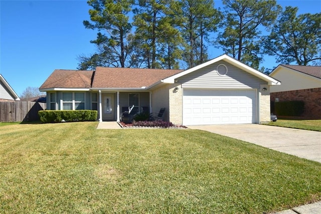 ranch-style home with an attached garage, brick siding, concrete driveway, and a front yard